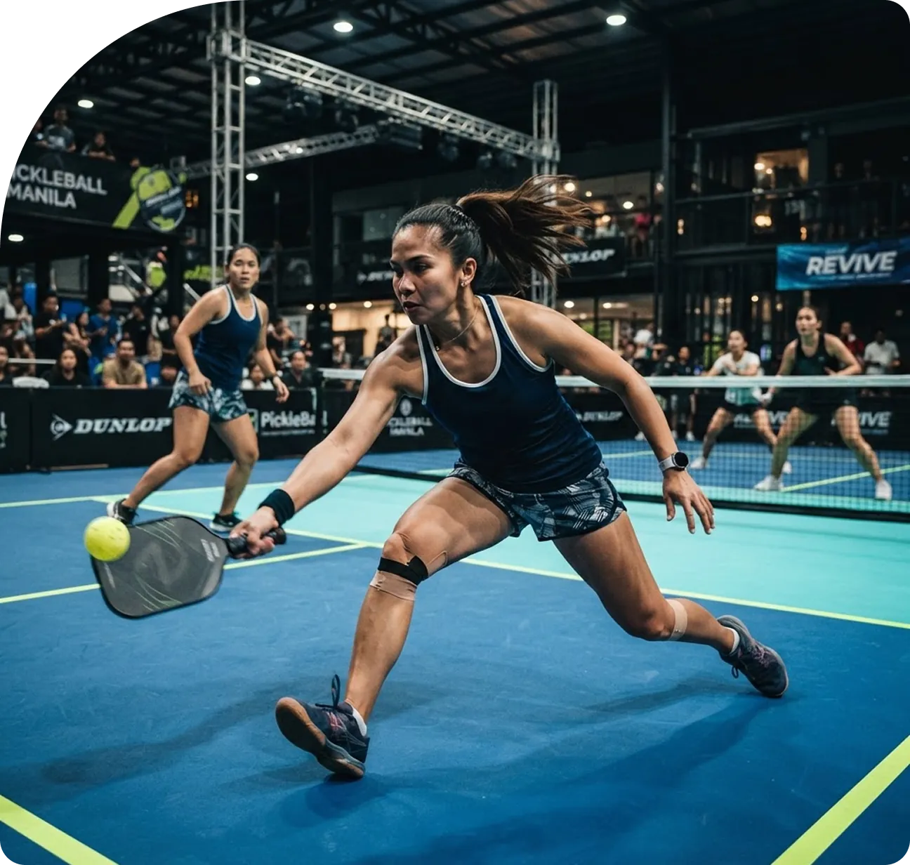Players on an indoor pickleball court